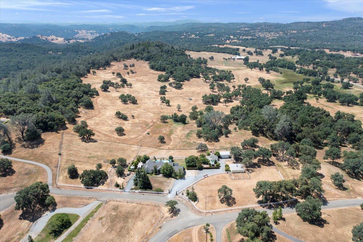 4558 Country View Court Cool, CA 95614 - Photo 13 of 71 an aerial view of house with yard and mountain view in back