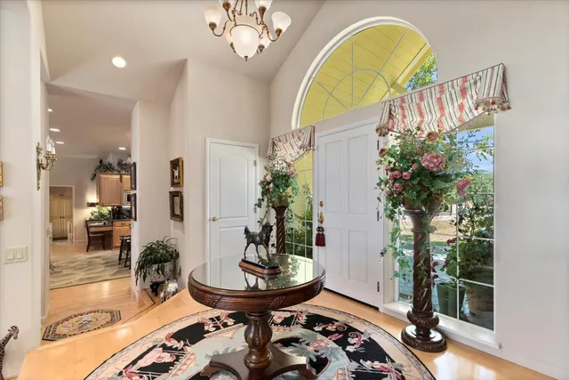 a kitchen with a sink and a large window