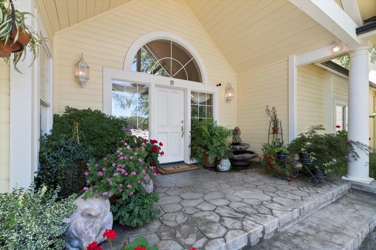 4558 Country View Court Cool, CA 95614 - Photo 3 of 71 a front view of a house with garden