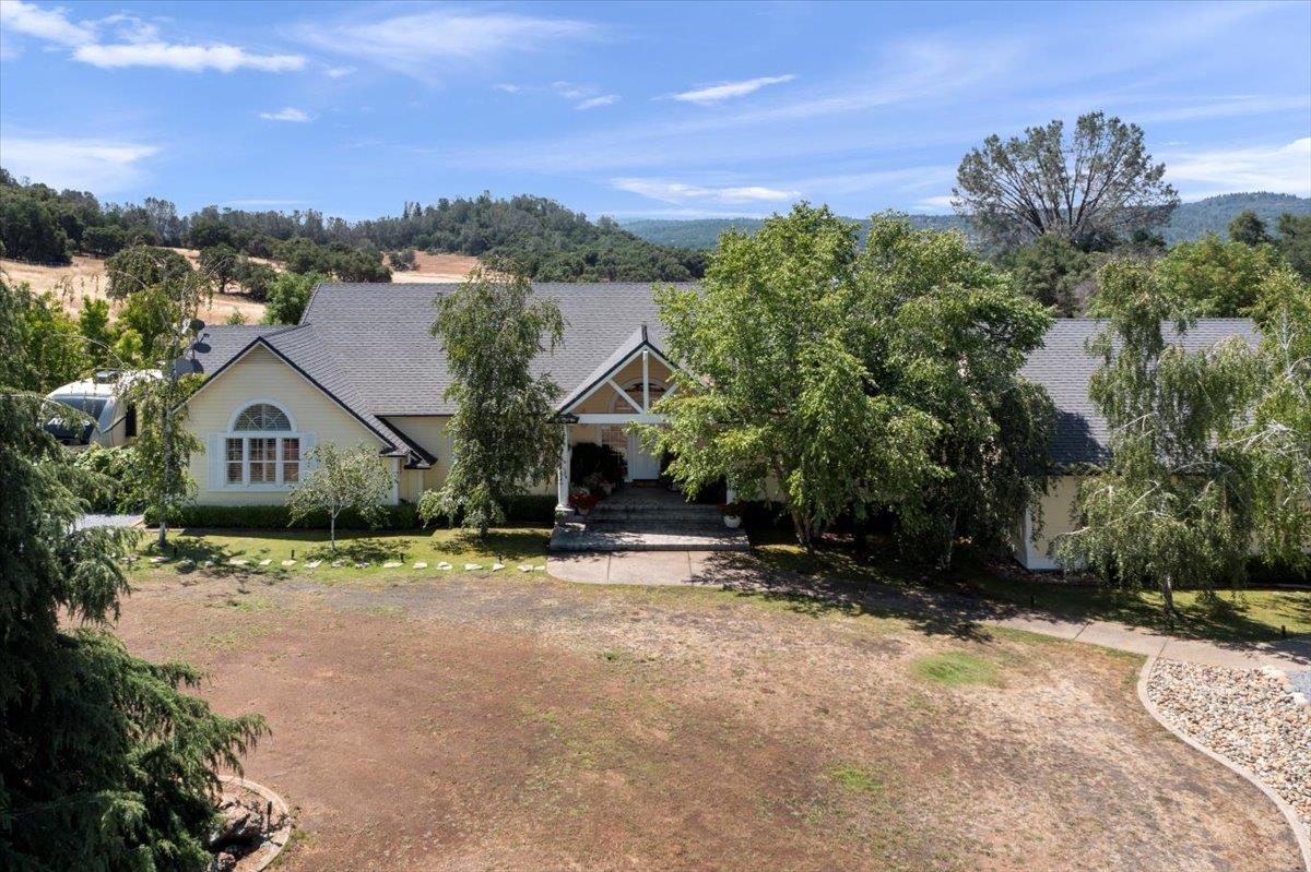 4558 Country View Court Cool, CA 95614 - Photo 9 of 71 a view of house with outdoor space and street view