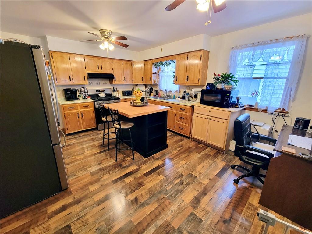311 Elm Street Vandergrift, PA 15690 - Photo 11 of 47 a kitchen with a sink appliances and cabinets