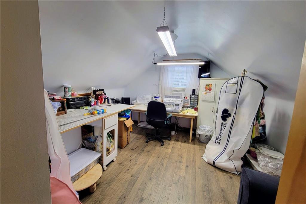 311 Elm Street Vandergrift, PA 15690 - Photo 21 of 47 a view of a workspace with furniture and a window