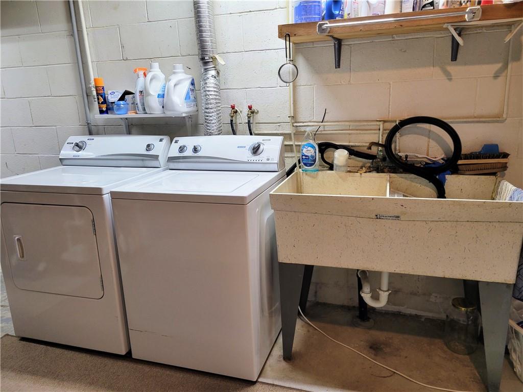 311 Elm Street Vandergrift, PA 15690 - Photo 29 of 47 a bathroom with a sink and a mirror