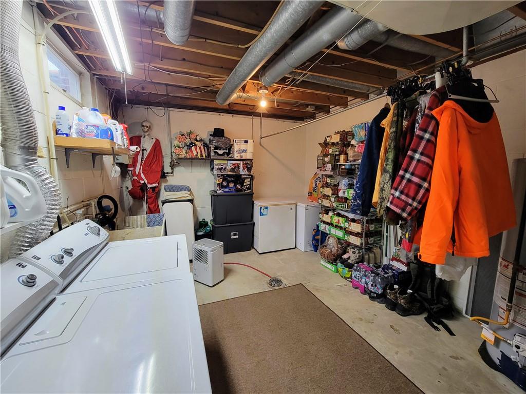 311 Elm Street Vandergrift, PA 15690 - Photo 30 of 47 a view of walk in closet with clothes and shoes