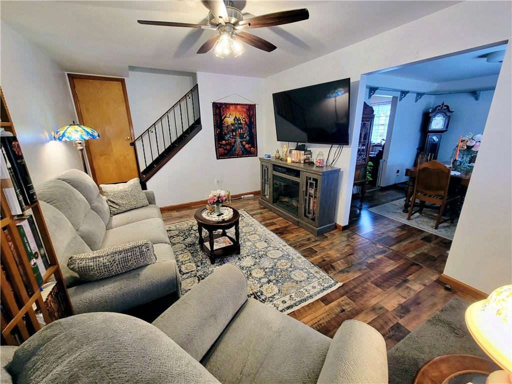 311 Elm Street Vandergrift, PA 15690 - Photo 8 of 47 a living room with furniture and a flat screen tv