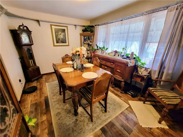 a kitchen with a sink appliances and cabinets