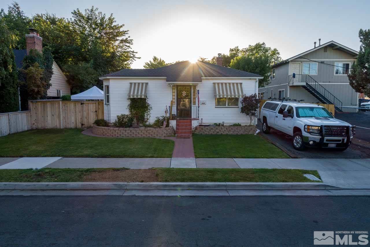 1011 Wright Street Reno, NV 89509 - Photo 1 of 21 a front view of a house with a garden and plants