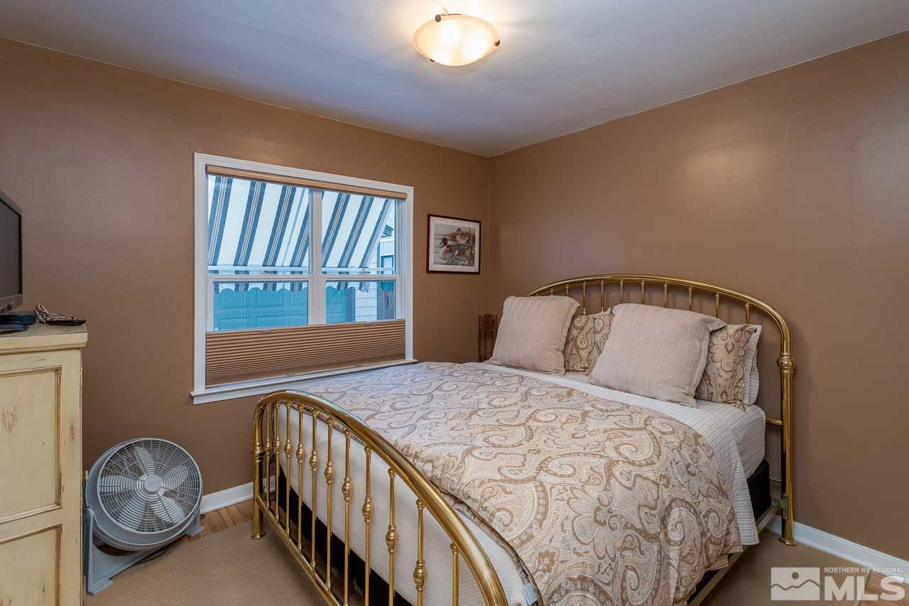 1011 Wright Street Reno, NV 89509 - Photo 15 of 21 a bedroom with a bed and a window