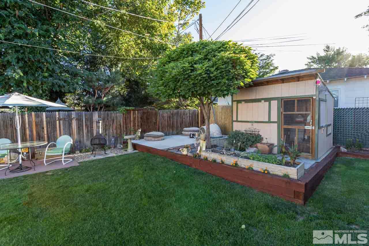 1011 Wright Street Reno, NV 89509 - Photo 19 of 21 a view of a chair and table in backyard of house