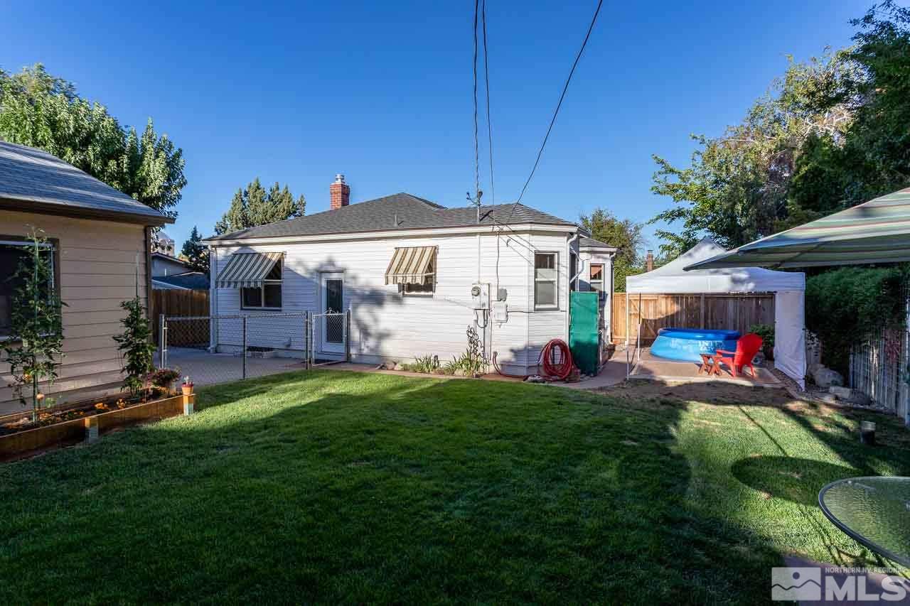 1011 Wright Street Reno, NV 89509 - Photo 20 of 21 a view of a house with a yard
