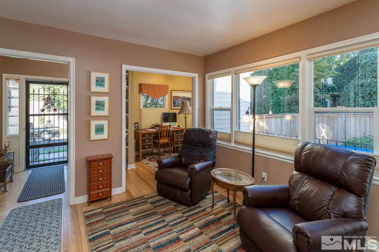 1011 Wright Street Reno, NV 89509 - Photo 8 of 21 a living room with furniture and a floor to ceiling window