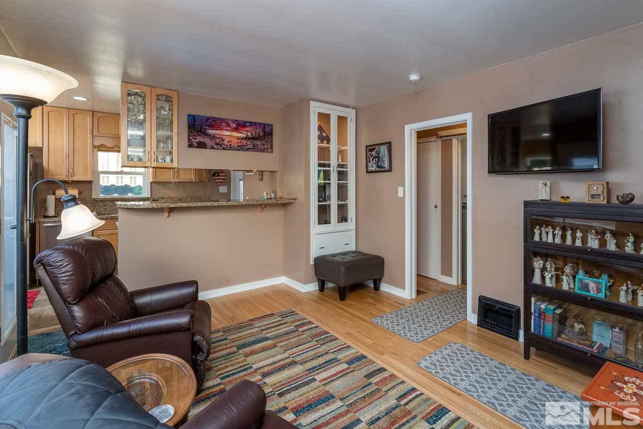 1011 Wright Street Reno, NV 89509 - Photo 10 of 21 a living room with furniture and a flat screen tv