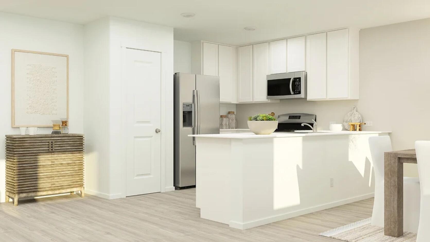 2126 Edgewood Street Lubbock, TX 79403 - Photo 6 of 11 a kitchen with stainless steel appliances white cabinets and a refrigerator