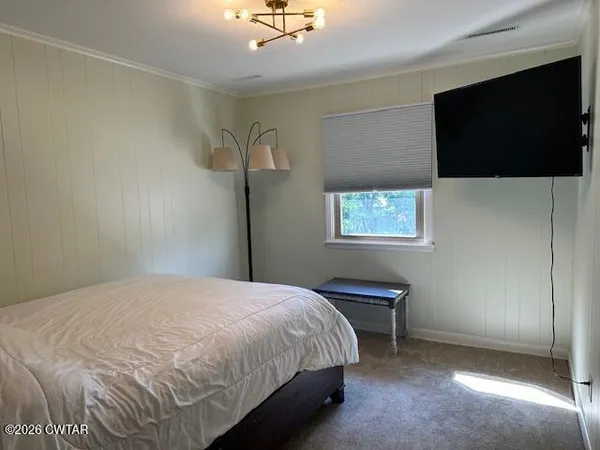 a bathroom with a vanity and a mirror