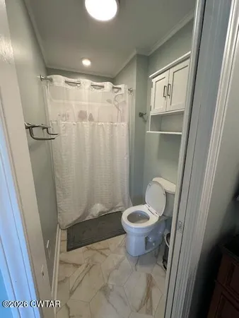 a bathroom with 2 sink and a mirror