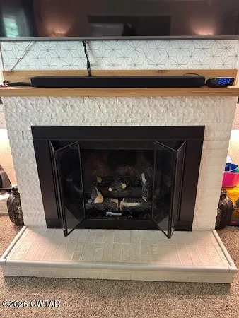 a close view of a fireplace in a room