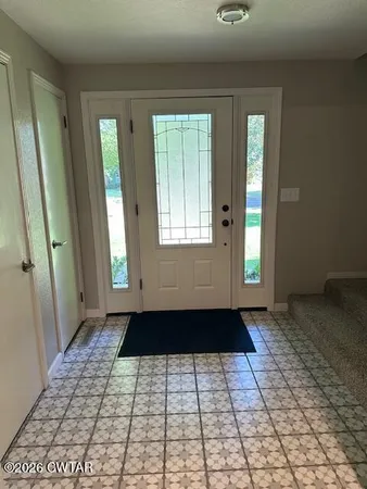 a view of an empty room with window