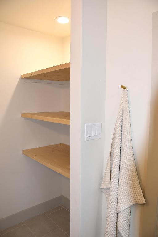 1314 East 13th Street Austin, TX 78702 - Photo 15 of 20 a view of walk in closet with wooden floor