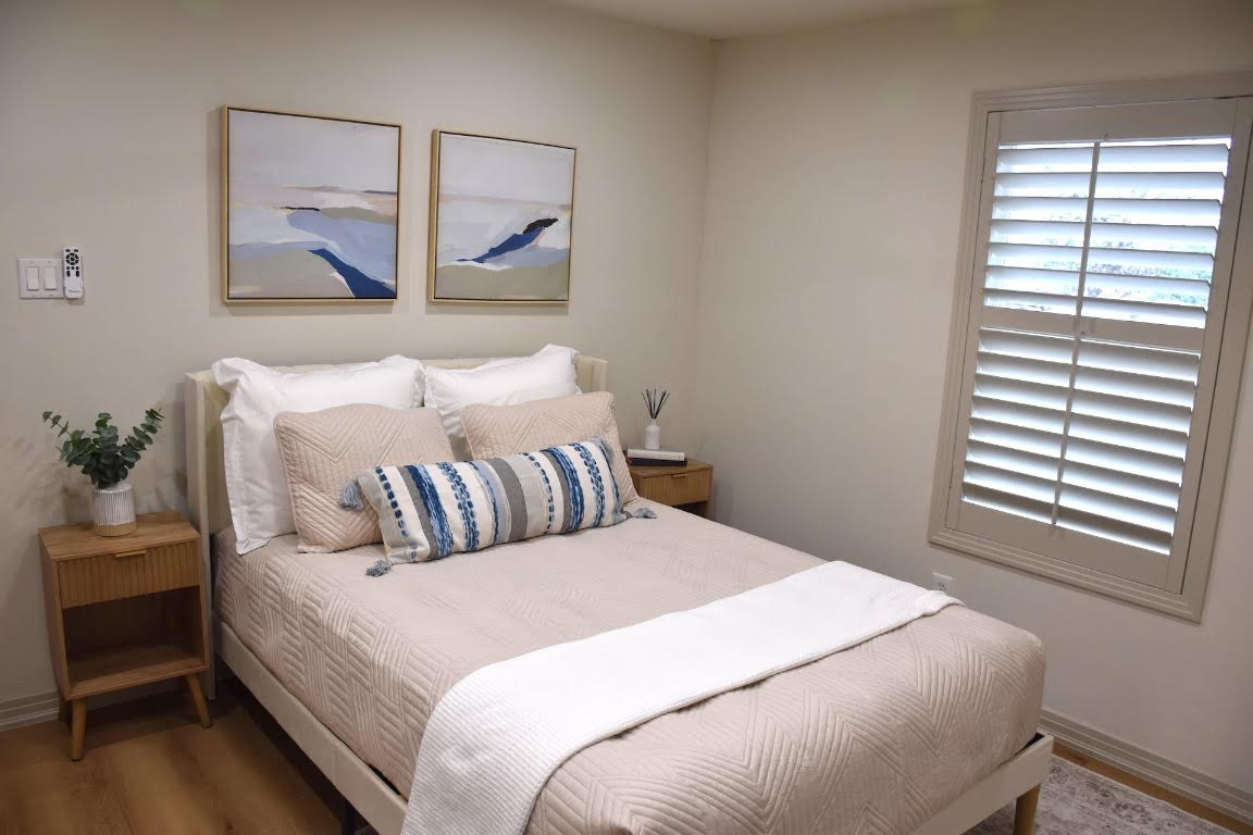 1314 East 13th Street Austin, TX 78702 - Photo 16 of 20 a bedroom with a bed and a window