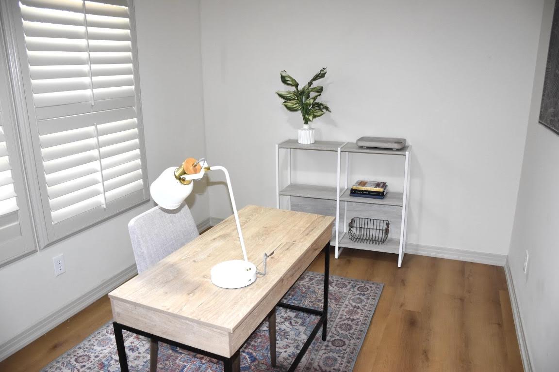 1314 East 13th Street Austin, TX 78702 - Photo 17 of 20 a view of a workspace with furniture and a window