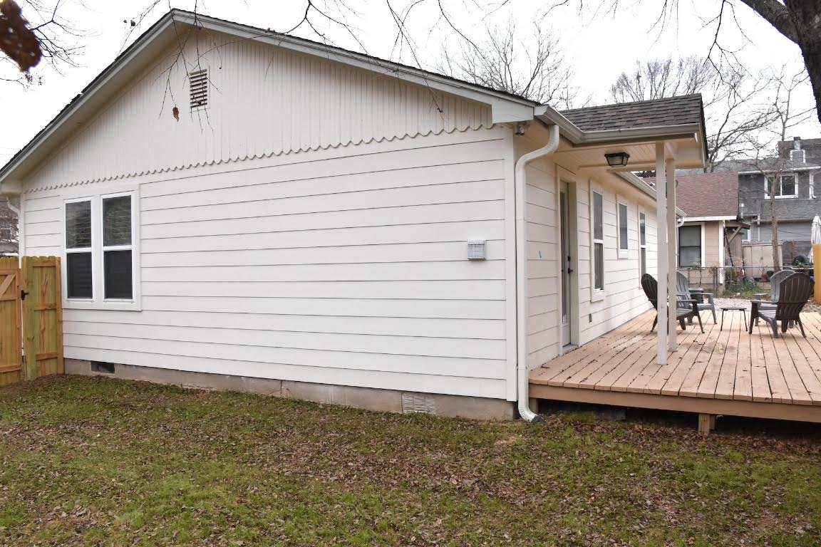 1314 East 13th Street Austin, TX 78702 - Photo 5 of 20 a small white building with a white roof deck
