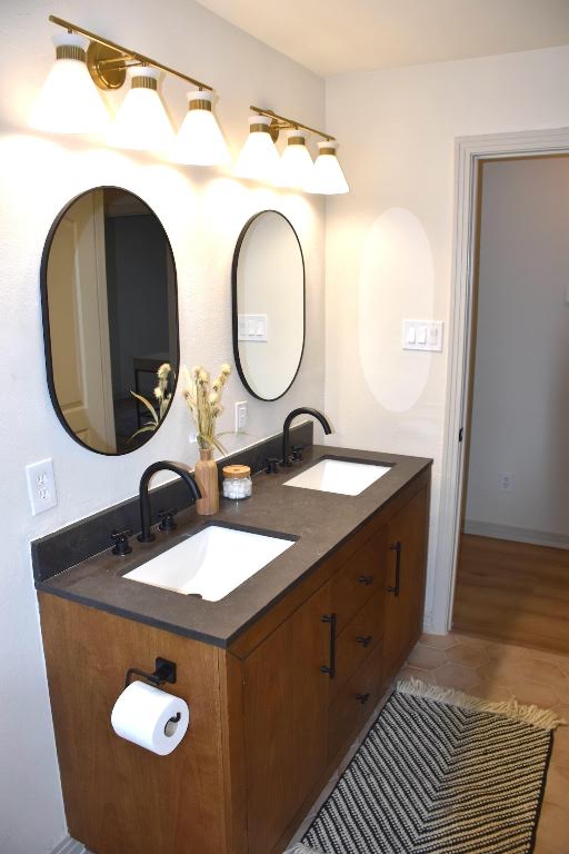 1314 East 13th Street Austin, TX 78702 - Photo 7 of 20 a bathroom with a sink and a mirror