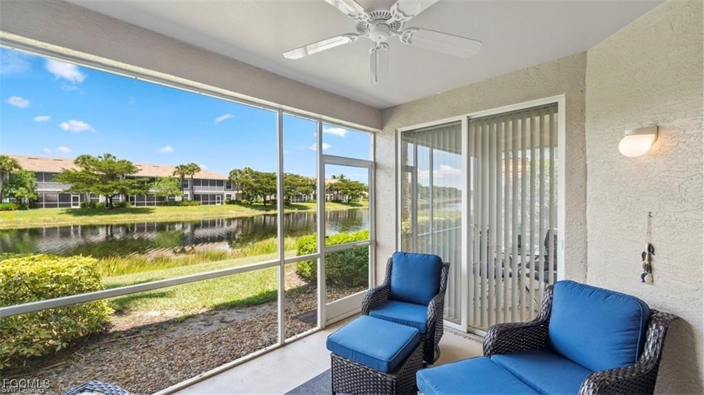 9582 Hemingway Lane, Unit 3402 Fort Myers, FL 33913 - Photo 20 of 27 a living room with furniture and a floor to ceiling window