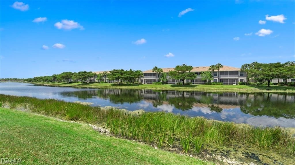 9582 Hemingway Lane, Unit 3402 Fort Myers, FL 33913 - Photo 21 of 27 a view of a lake with a city