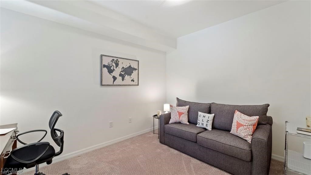 9582 Hemingway Lane, Unit 3402 Fort Myers, FL 33913 - Photo 8 of 27 a living room with a couch and a view of wooden floor