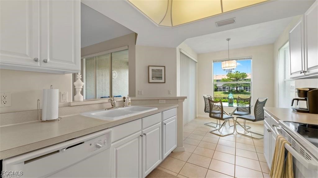 9582 Hemingway Lane, Unit 3402 Fort Myers, FL 33913 - Photo 10 of 27 a spacious bathroom with a granite countertop sink and a mirror