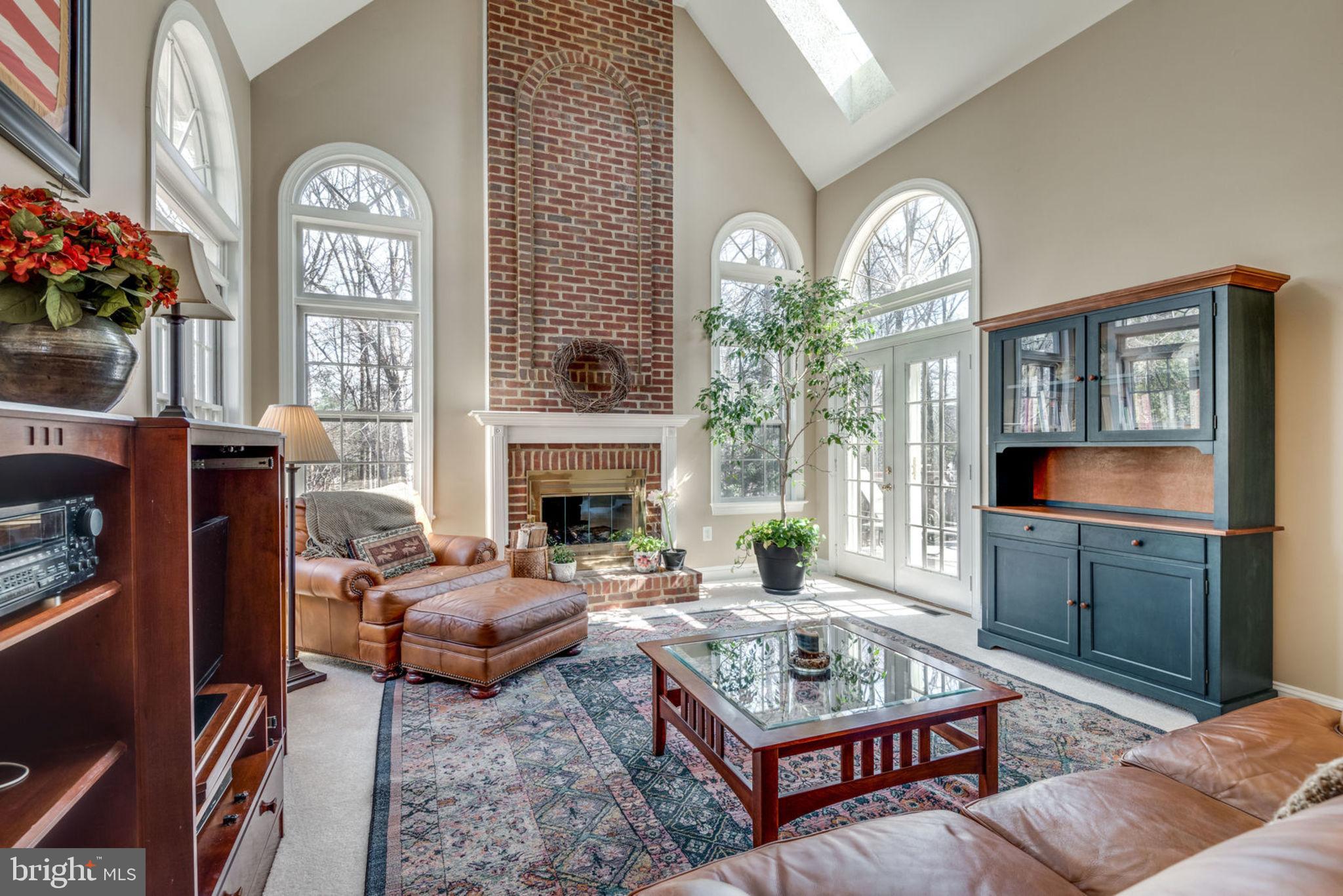 11261 Center Harbor Road Reston, VA 20194 - Photo 15 of 51 Family room is huge with 2 story ceilings