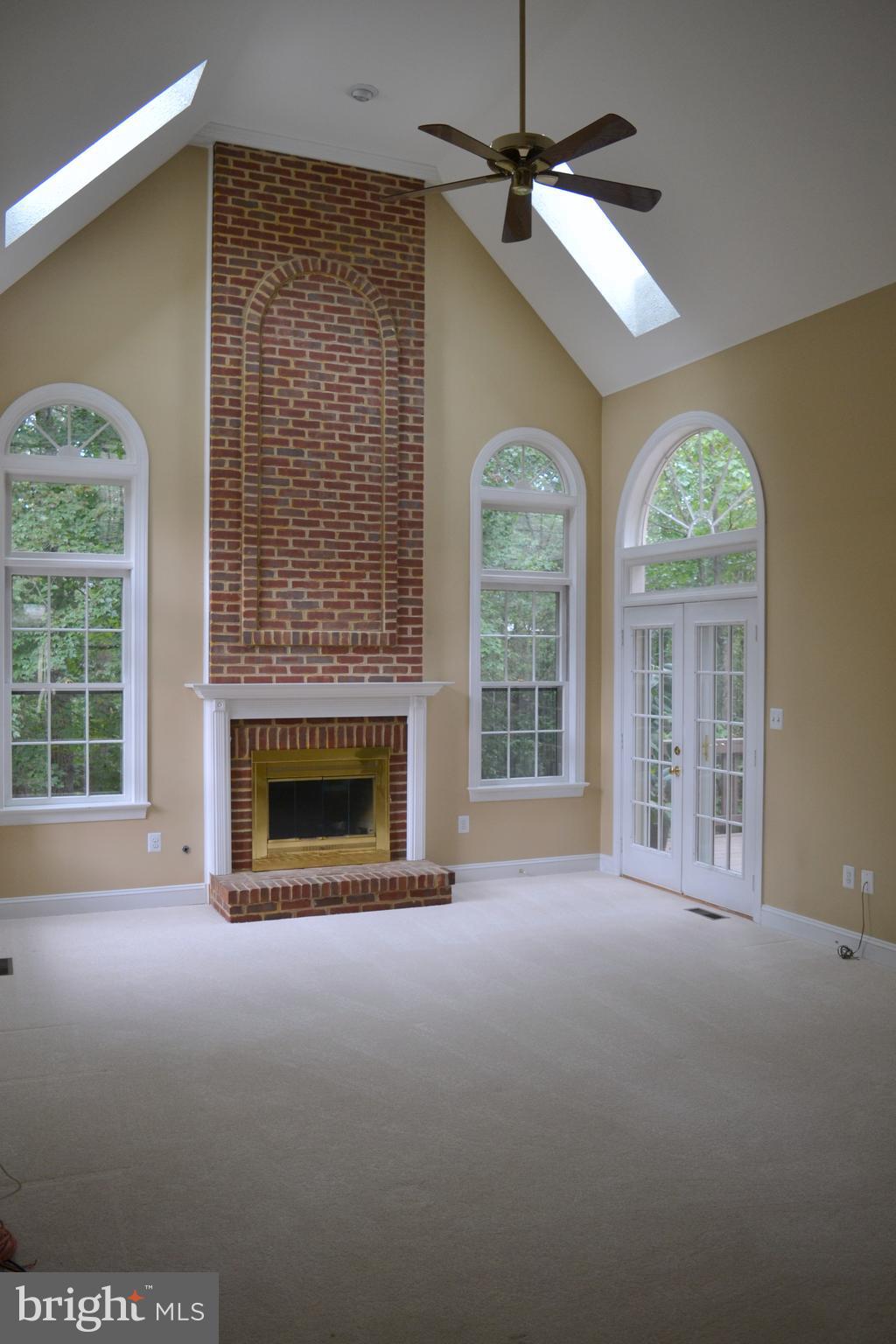 11261 Center Harbor Road Reston, VA 20194 - Photo 18 of 51 Imagine cozy fires in this spacious family room!