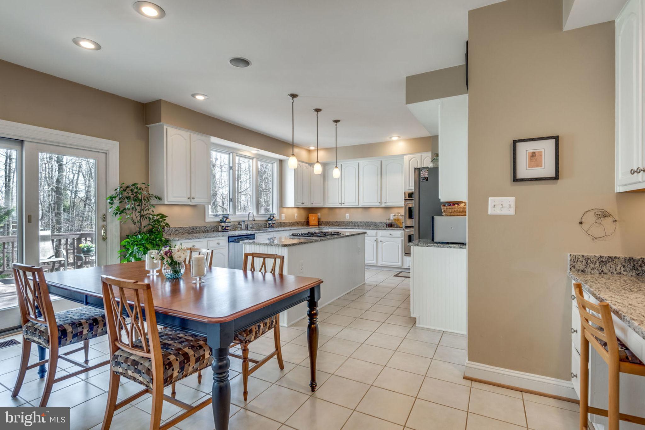 11261 Center Harbor Road Reston, VA 20194 - Photo 24 of 51 Eat in kitchen with sliding door to the deck