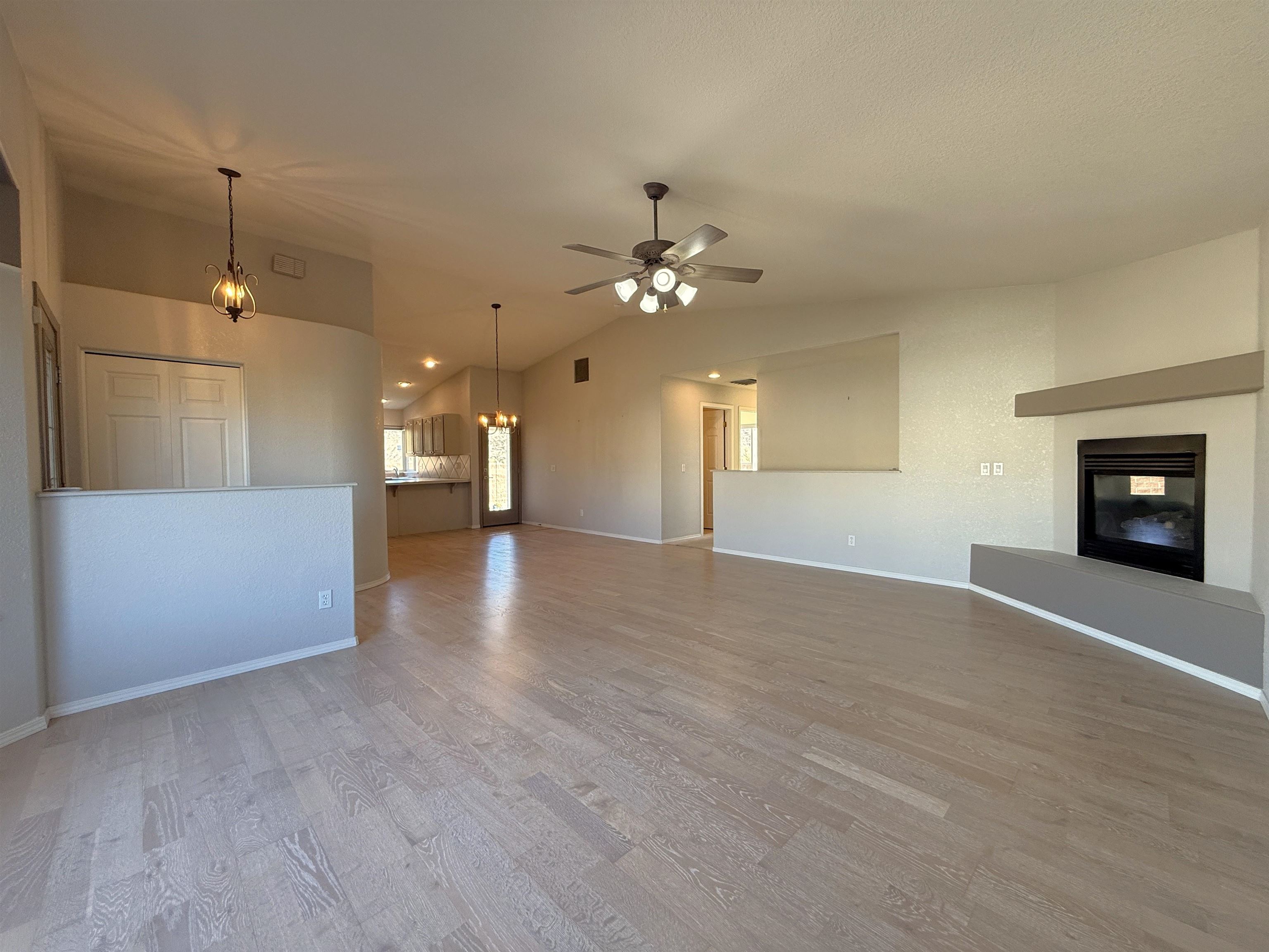 1459 Racquet Way Grand Junction, CO 81506 - Photo 13 of 42 a view of an empty room with a fireplace
