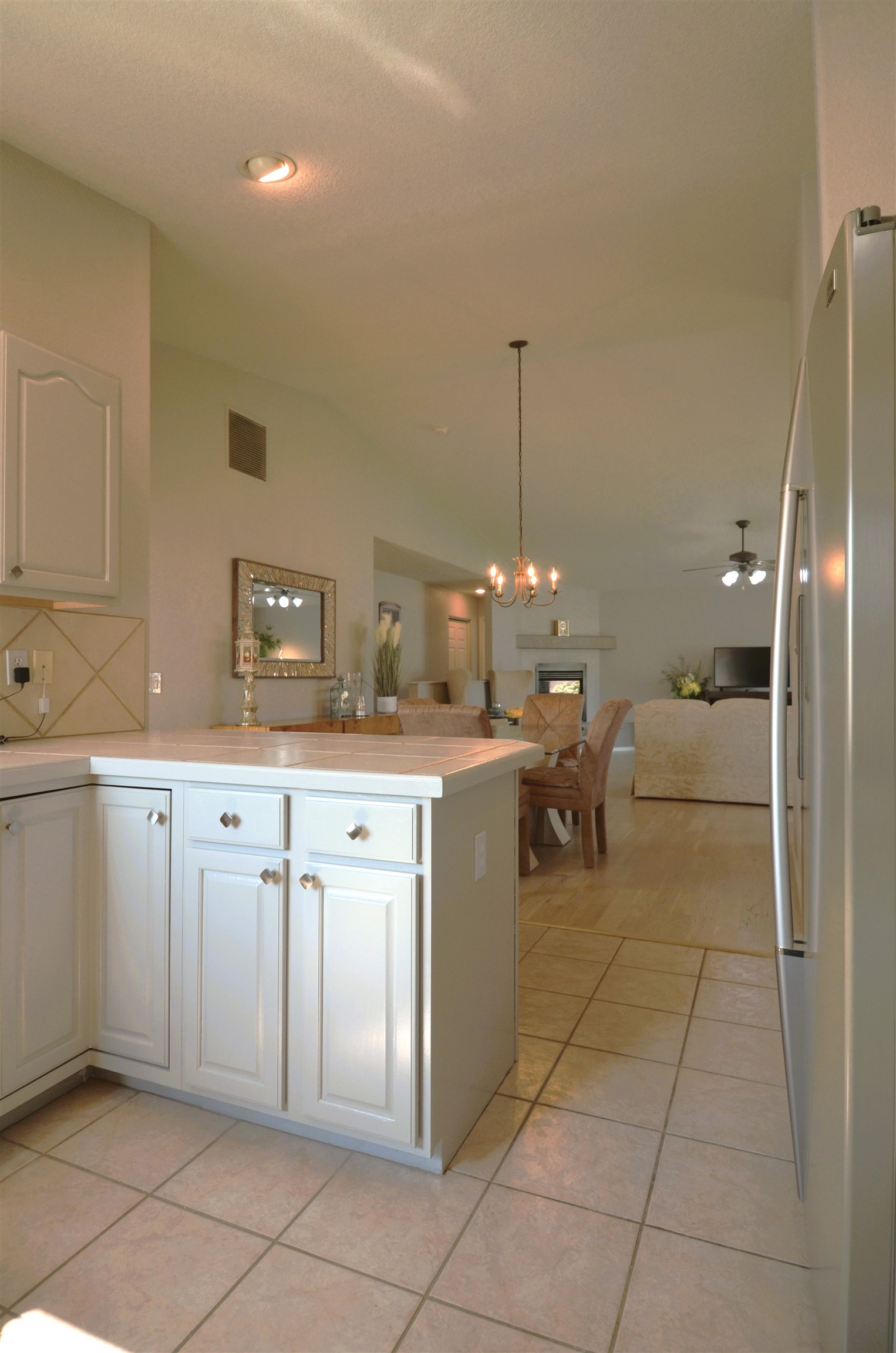 1459 Racquet Way Grand Junction, CO 81506 - Photo 20 of 42 a kitchen with cabinets and chairs