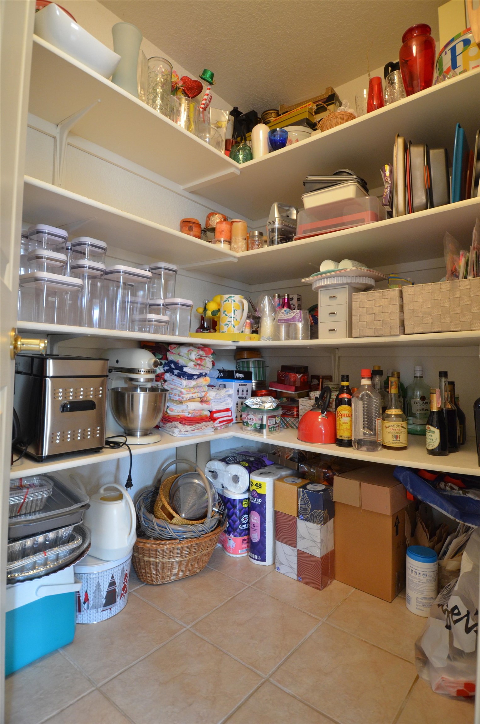 1459 Racquet Way Grand Junction, CO 81506 - Photo 23 of 42 a kitchen with lots of clutter and stainless steel appliances