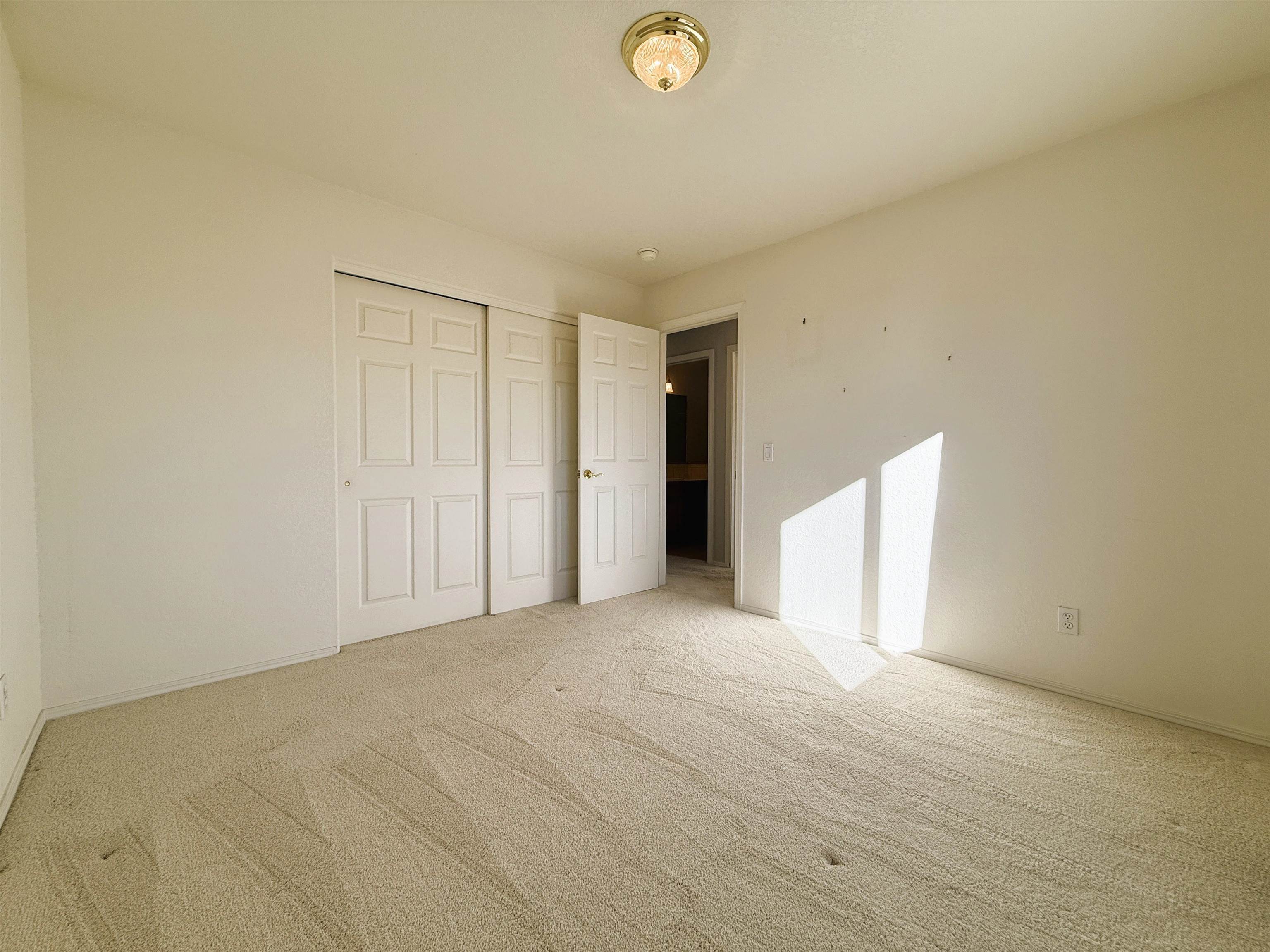 1459 Racquet Way Grand Junction, CO 81506 - Photo 42 of 42 a view of an empty room and window