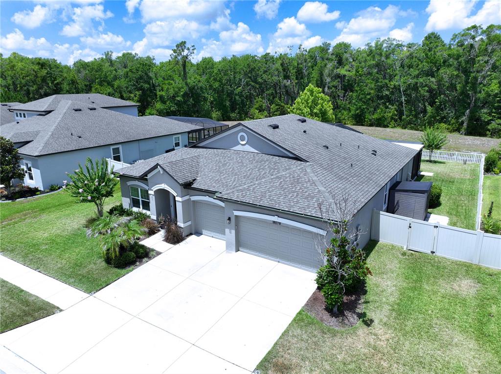 18078 Romanesque Court Spring Hill, FL 34610 - Photo 78 of 81 an aerial view of a house with a yard