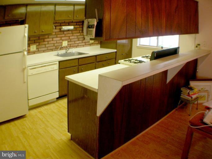 14931 Hydrus Road Silver Spring, MD 20906 - Photo 16 of 24 With 8' 6'' Breakfast Bar