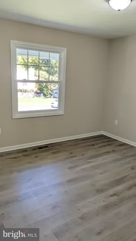 a view of a room that has a window