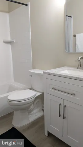 a bathroom with a toilet and a sink