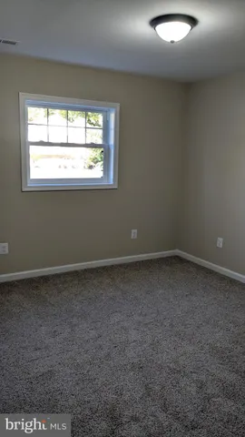 a view of a window in an empty room