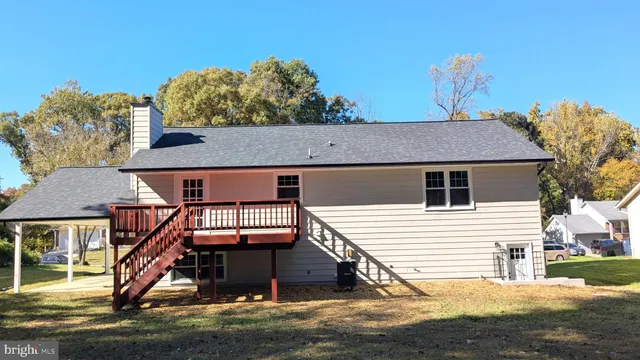 a aerial view of a house with swimming pool