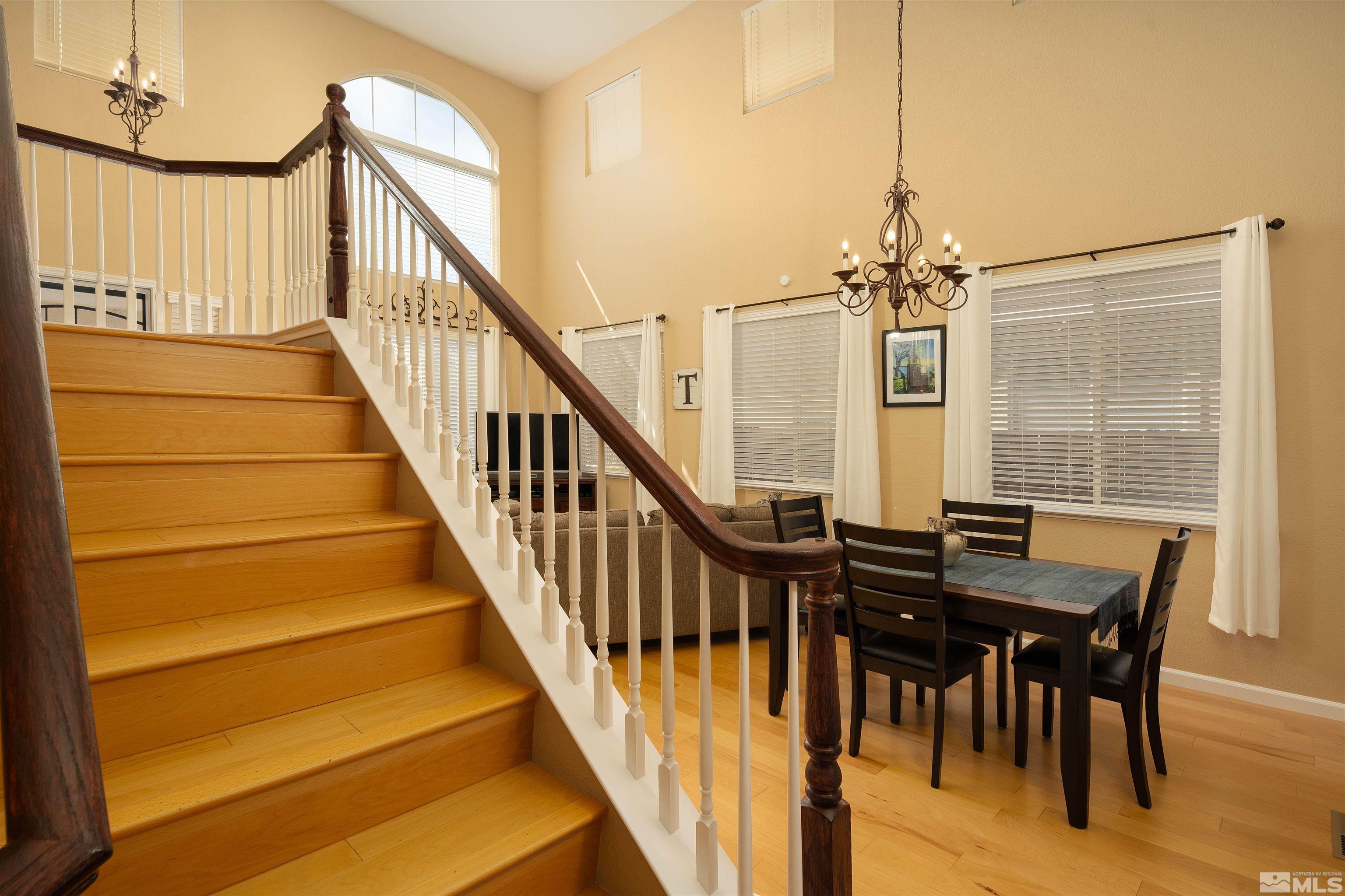 2325 Lincoln Meadows Drive Reno, NV 89521 - Photo 12 of 33 a view of a dining room with furniture window and wooden floor