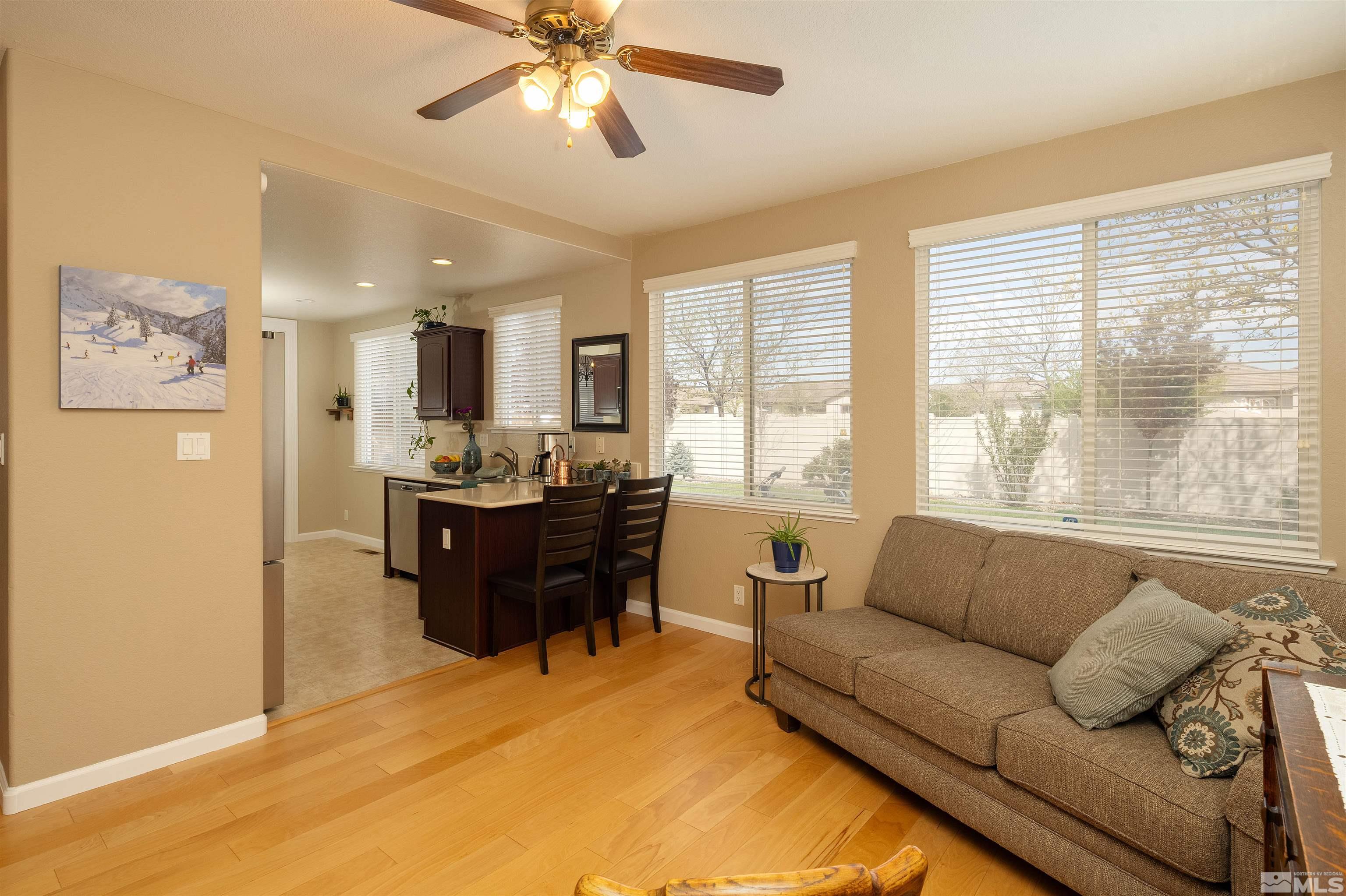 2325 Lincoln Meadows Drive Reno, NV 89521 - Photo 17 of 33 a living room with furniture and a large window