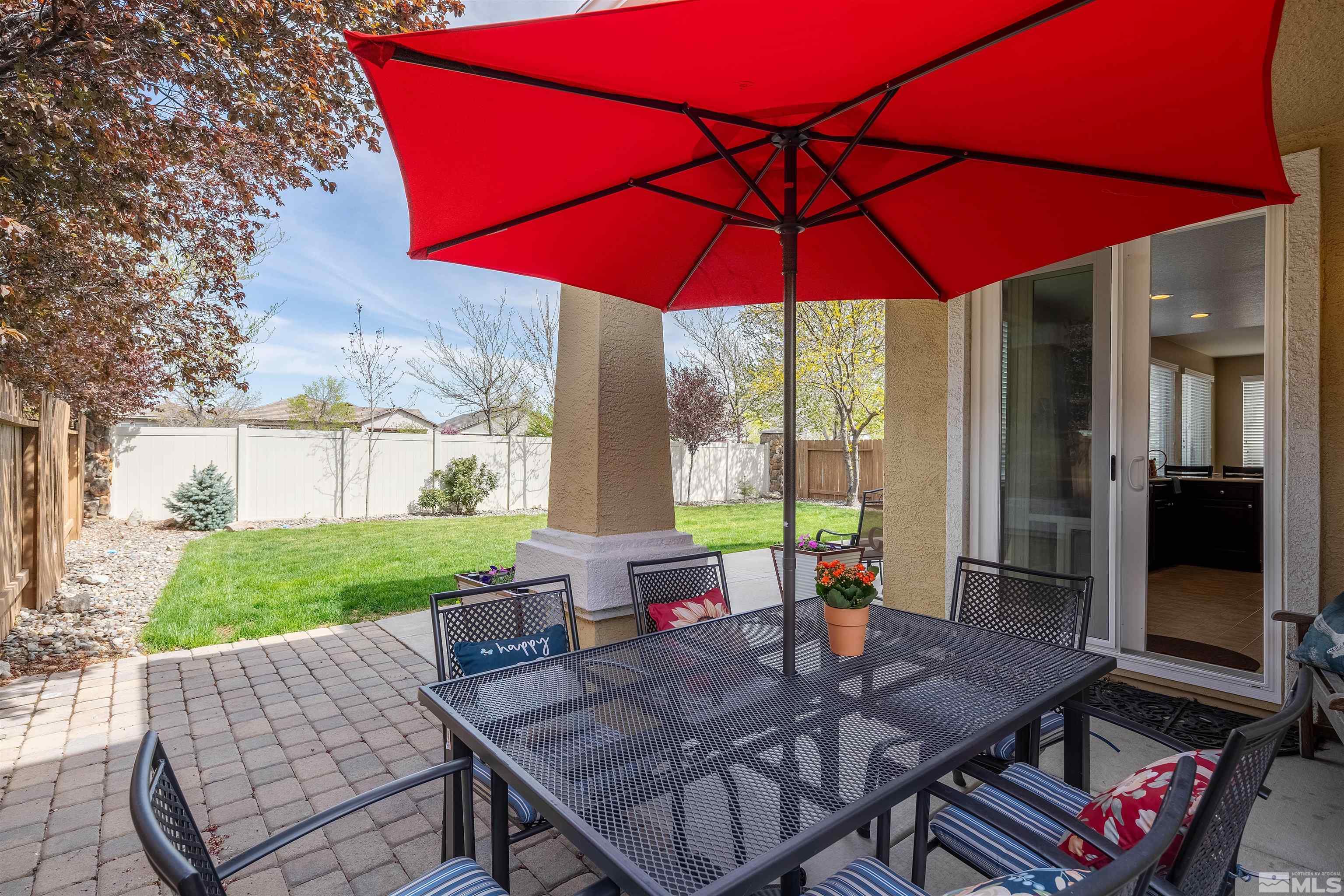 2325 Lincoln Meadows Drive Reno, NV 89521 - Photo 19 of 33 a view of an outdoor sitting area with furniture and backyard