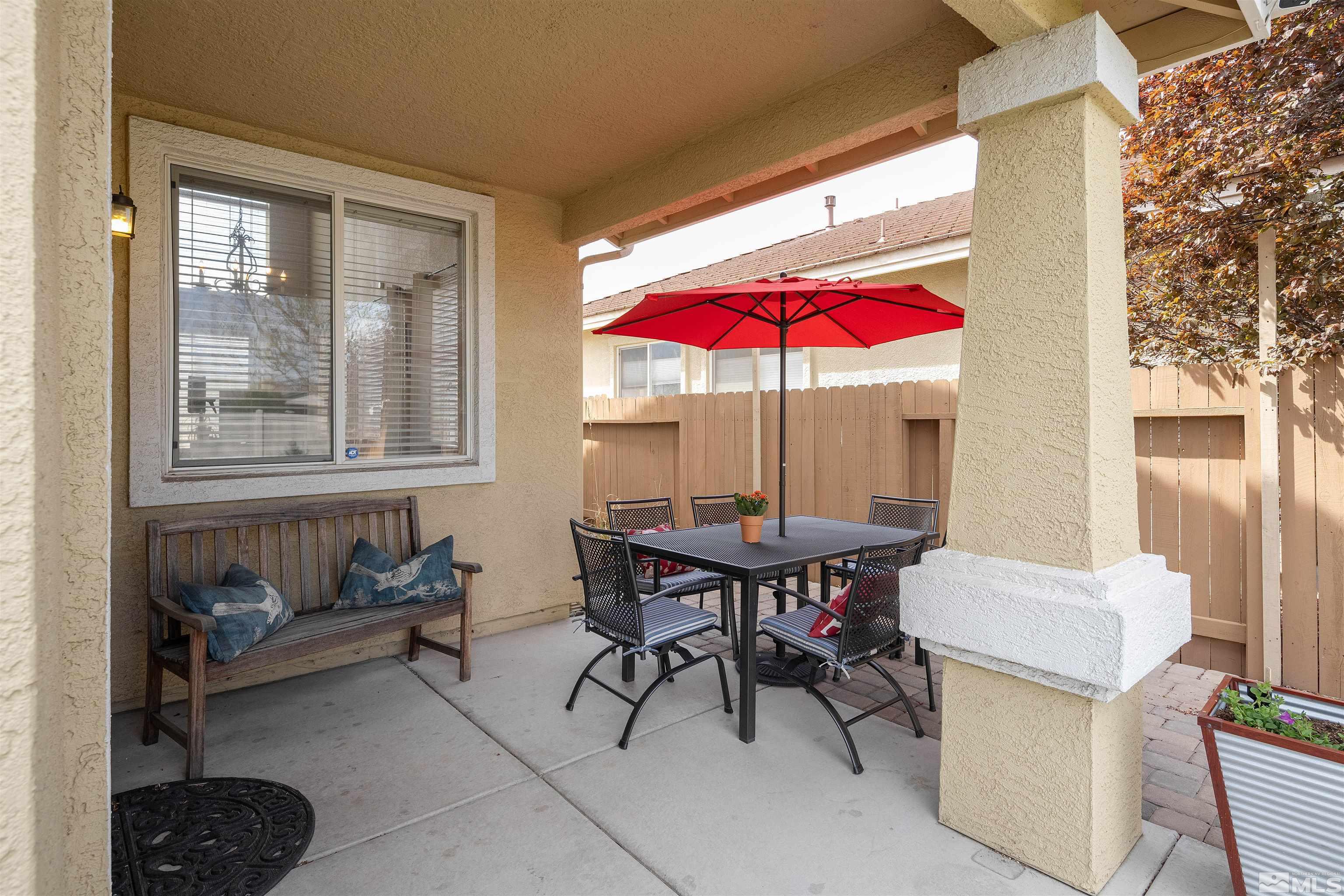 2325 Lincoln Meadows Drive Reno, NV 89521 - Photo 20 of 33 a view of a dining room with furniture and chandelier