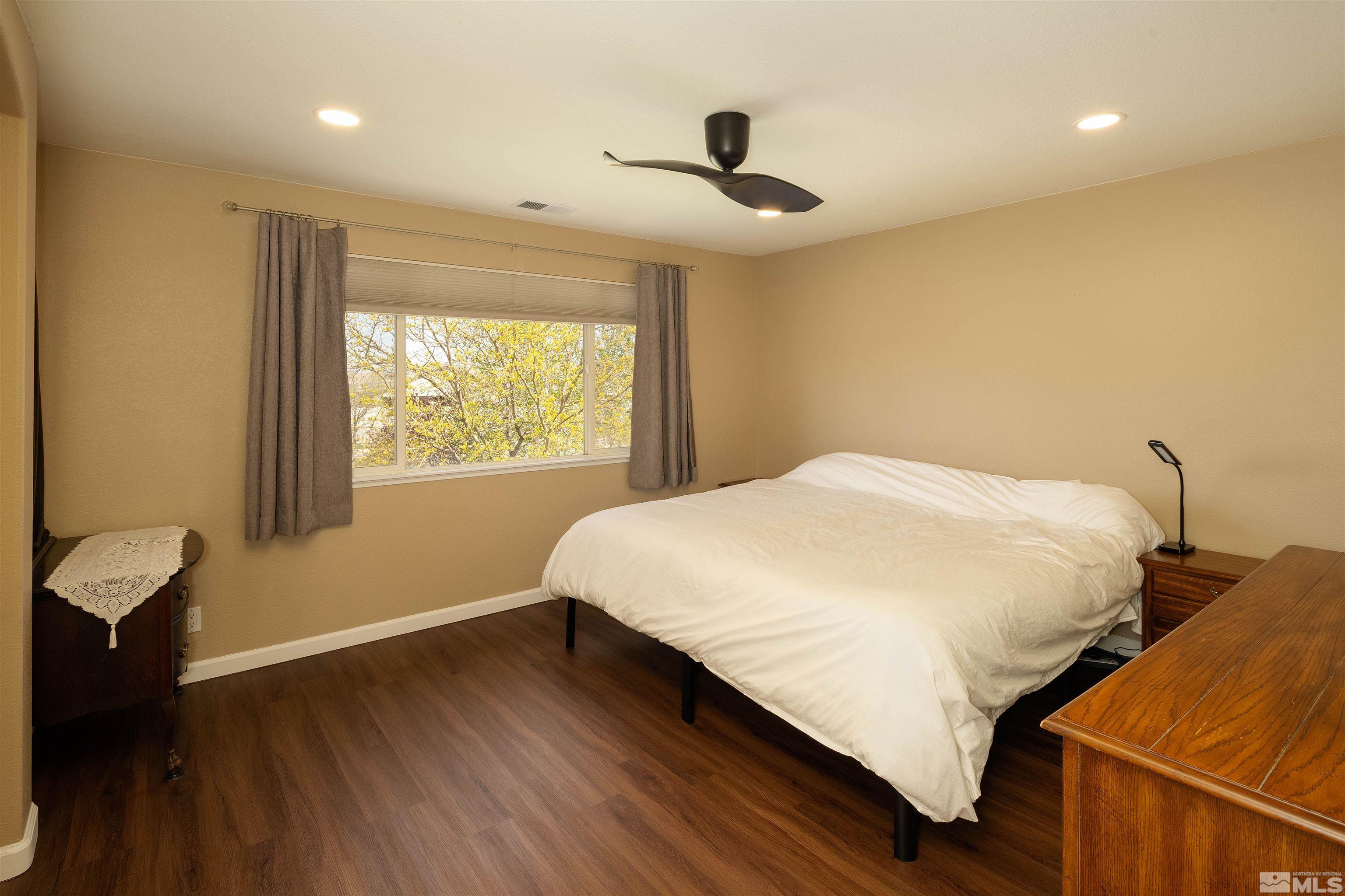 2325 Lincoln Meadows Drive Reno, NV 89521 - Photo 27 of 33 a bedroom with bed and window