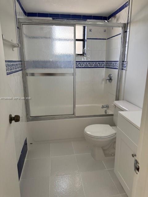 13404 Southwest 62nd Street, Unit 101L Miami, FL 33183 - Photo 16 of 46 a bathroom with a toilet and a shower