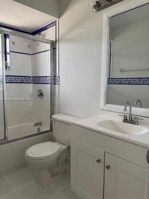 13404 Southwest 62nd Street, Unit 101L Miami, FL 33183 - Photo 17 of 46 a bathroom with a sink a toilet and shower
